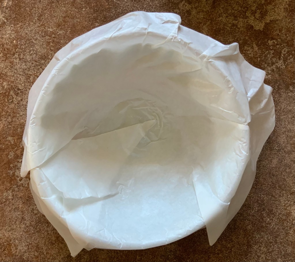 After parchment is pressed down for raisin bread