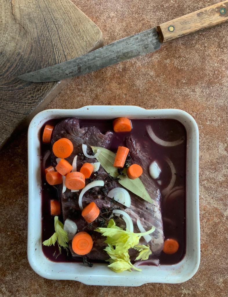 Brisket red win marinade lardons braise