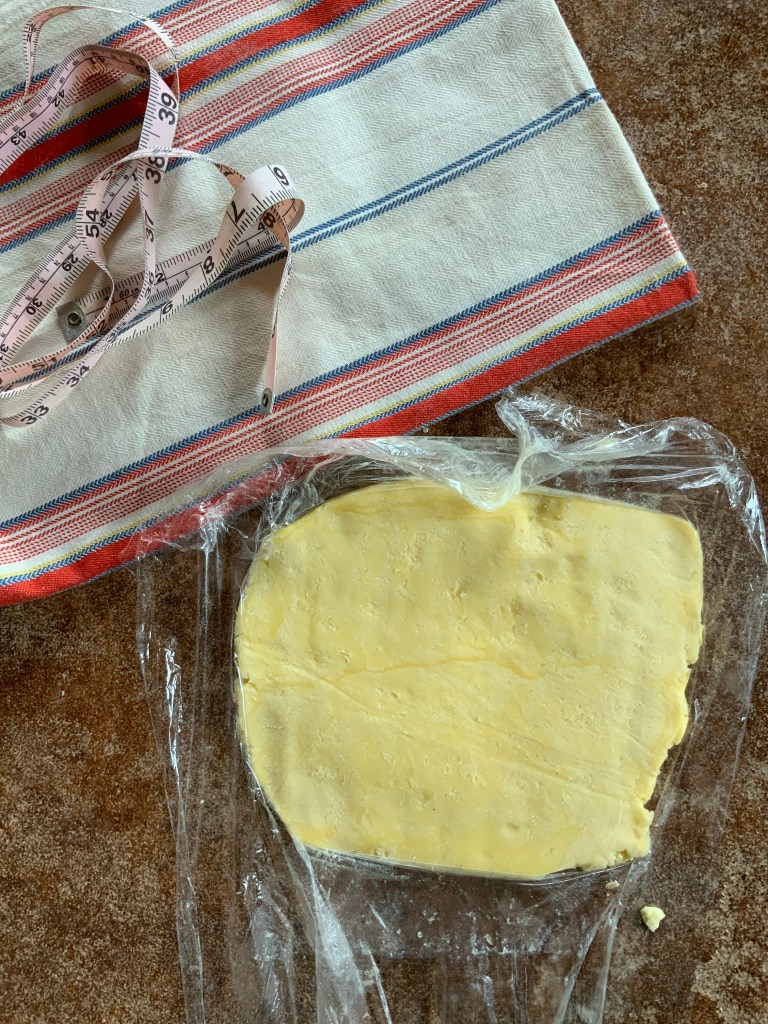 Butter block pounded to appromate square 7 x 7.5 ready to chill 30 minutes before first set of turns