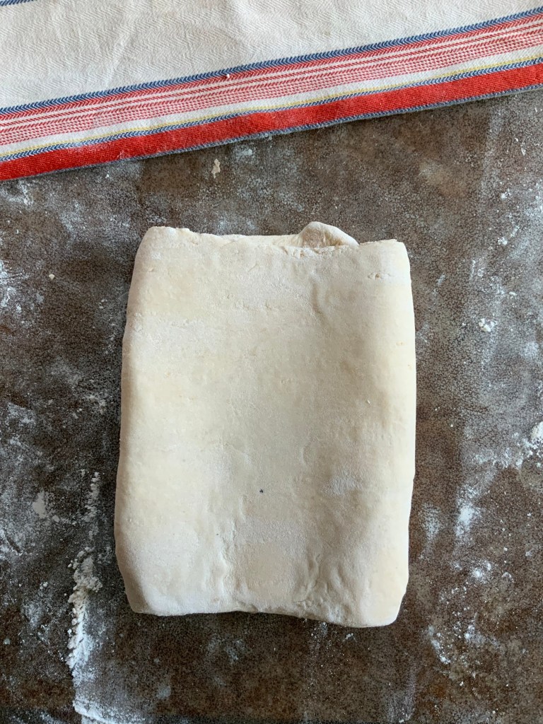 90 degree turn so folds face you and ready for 2nd and last fold of 1st setroout of 3 for first turn total