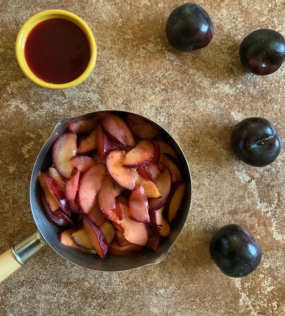 Soften plums and cool in metal container in refrigerator..reserve juice from softening